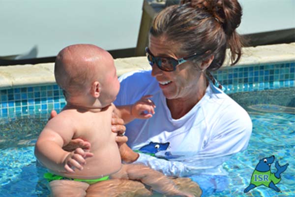 Swim instructor with infant