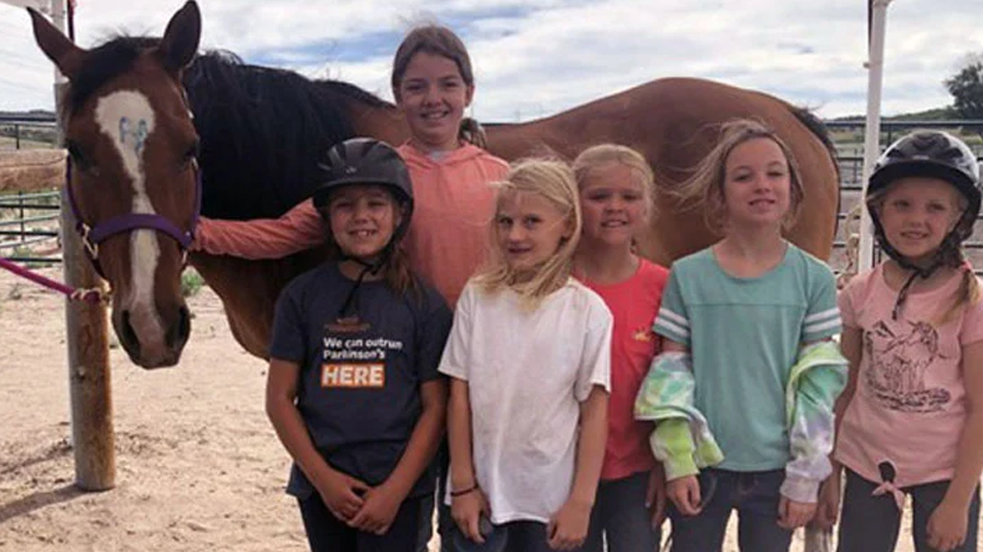 Teenage Horse Trainer with younger students